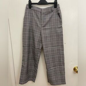 Gently worn plaid capris.